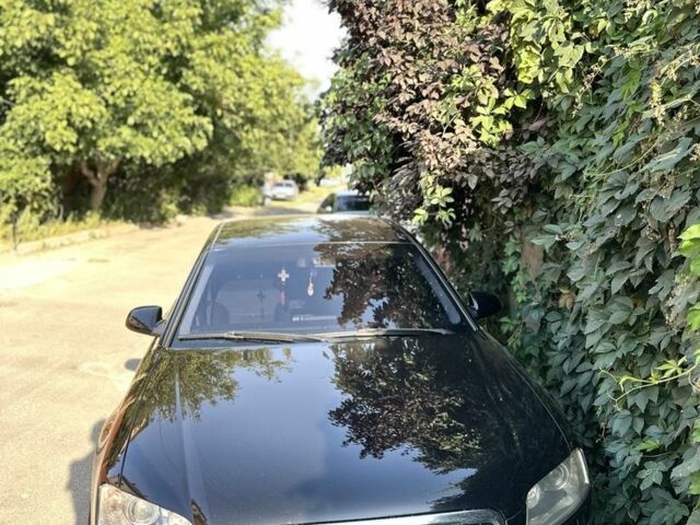 Черный Ауди А8, объемом двигателя 4.2 л и пробегом 320 тыс. км за 5500 $, фото 1 на Automoto.ua