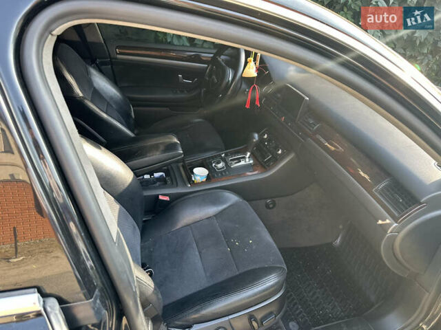 Черный Ауди А8, объемом двигателя 4.17 л и пробегом 322 тыс. км за 6000 $, фото 4 на Automoto.ua