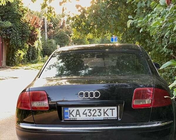 Чорний Ауді A8, об'ємом двигуна 4.2 л та пробігом 318 тис. км за 6500 $, фото 1 на Automoto.ua