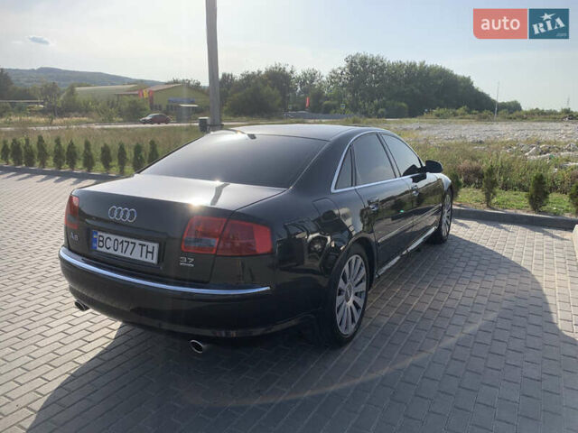 Черный Ауди А8, объемом двигателя 3.7 л и пробегом 330 тыс. км за 6500 $, фото 9 на Automoto.ua