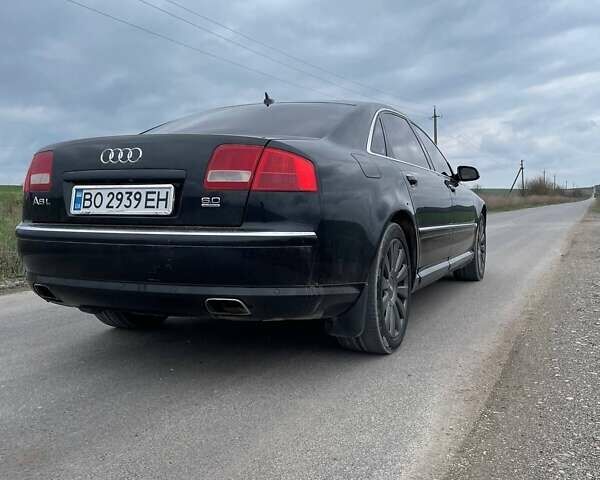 Черный Ауди А8, объемом двигателя 6 л и пробегом 230 тыс. км за 7000 $, фото 1 на Automoto.ua