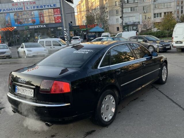 Черный Ауди А8, объемом двигателя 3 л и пробегом 336 тыс. км за 6000 $, фото 3 на Automoto.ua