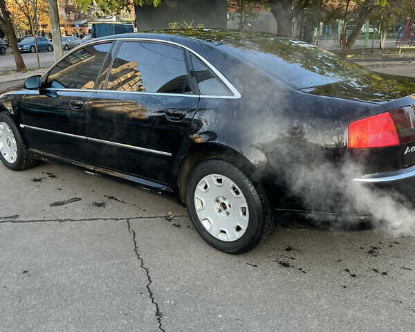 Черный Ауди А8, объемом двигателя 2.98 л и пробегом 336 тыс. км за 6000 $, фото 5 на Automoto.ua