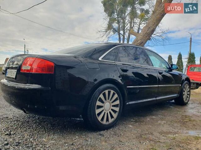 Черный Ауди А8, объемом двигателя 2.98 л и пробегом 315 тыс. км за 8900 $, фото 2 на Automoto.ua