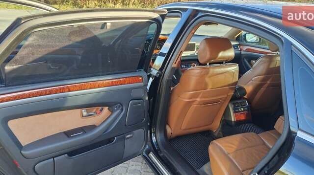 Черный Ауди А8, объемом двигателя 4.2 л и пробегом 326 тыс. км за 5800 $, фото 6 на Automoto.ua