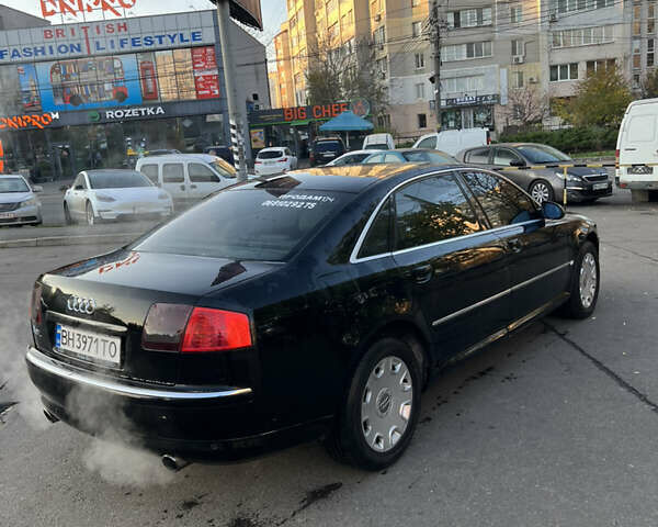 Черный Ауди А8, объемом двигателя 2.98 л и пробегом 336 тыс. км за 6000 $, фото 3 на Automoto.ua
