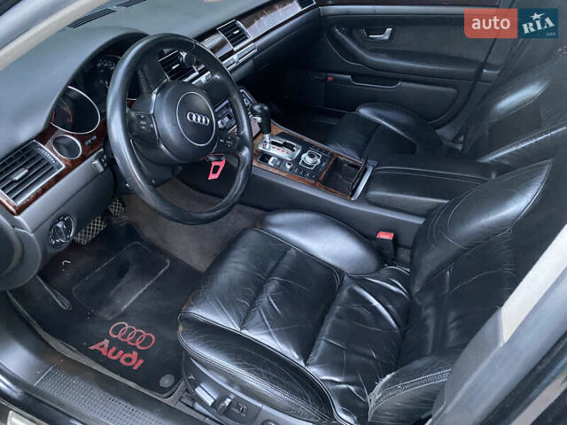 Черный Ауди А8, объемом двигателя 3 л и пробегом 300 тыс. км за 4650 $, фото 4 на Automoto.ua