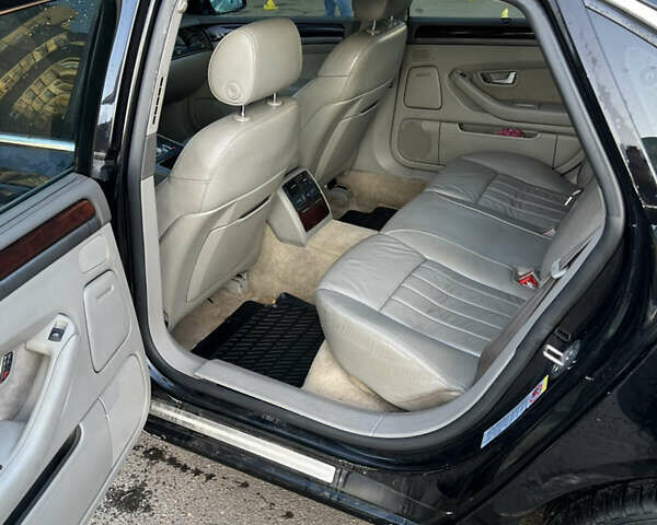 Черный Ауди А8, объемом двигателя 2.98 л и пробегом 336 тыс. км за 6000 $, фото 6 на Automoto.ua