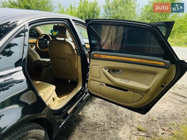 Чорний Ауді A8, об'ємом двигуна 4.2 л та пробігом 325 тис. км за 6500 $, фото 11 на Automoto.ua