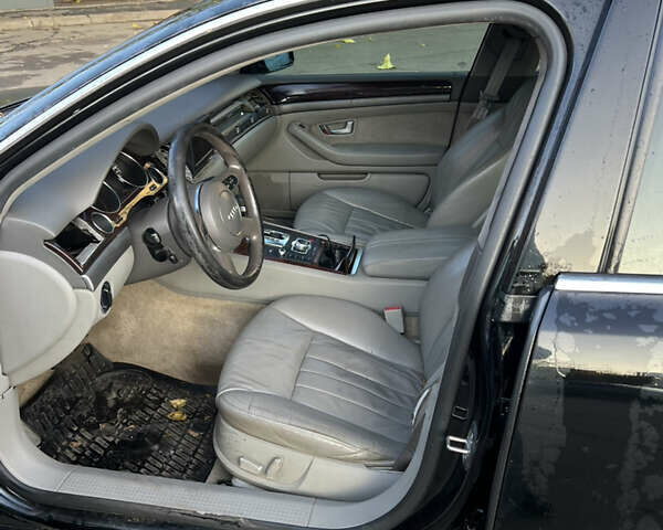 Черный Ауди А8, объемом двигателя 2.98 л и пробегом 336 тыс. км за 6000 $, фото 7 на Automoto.ua