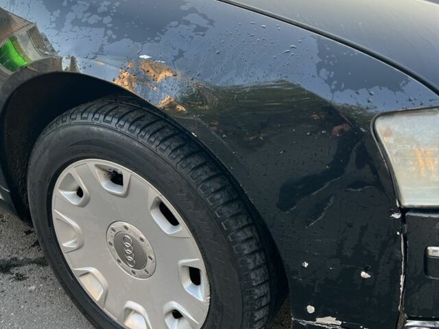 Черный Ауди А8, объемом двигателя 3 л и пробегом 336 тыс. км за 6000 $, фото 2 на Automoto.ua