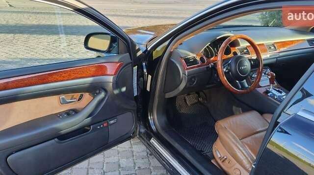 Черный Ауди А8, объемом двигателя 4.2 л и пробегом 326 тыс. км за 5800 $, фото 11 на Automoto.ua