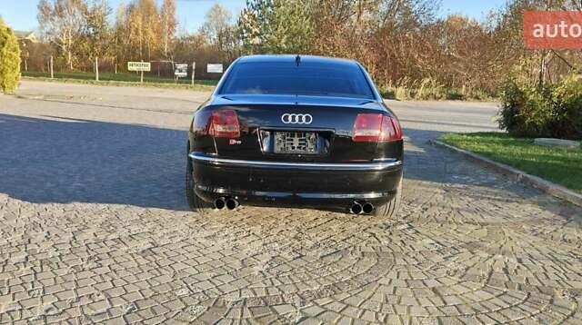 Черный Ауди А8, объемом двигателя 4.2 л и пробегом 326 тыс. км за 5800 $, фото 1 на Automoto.ua