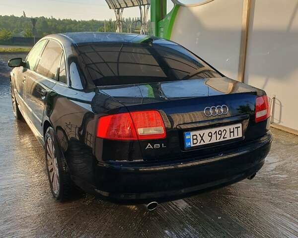 Черный Ауди А8, объемом двигателя 2.98 л и пробегом 315 тыс. км за 8900 $, фото 1 на Automoto.ua