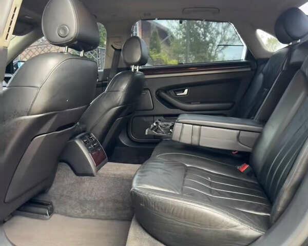Черный Ауди А8, объемом двигателя 3 л и пробегом 232 тыс. км за 6499 $, фото 2 на Automoto.ua