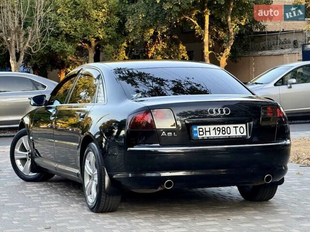 Черный Ауди А8, объемом двигателя 2.97 л и пробегом 337 тыс. км за 7900 $, фото 22 на Automoto.ua