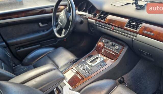 Черный Ауди А8, объемом двигателя 4.16 л и пробегом 325 тыс. км за 5000 $, фото 6 на Automoto.ua