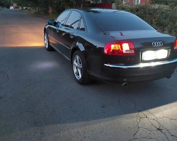 Черный Ауди А8, объемом двигателя 3.2 л и пробегом 250 тыс. км за 7500 $, фото 4 на Automoto.ua
