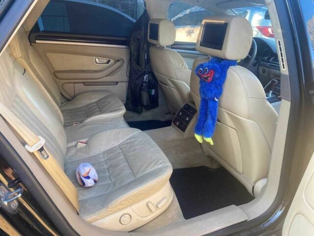 Черный Ауди А8, объемом двигателя 4.2 л и пробегом 250 тыс. км за 10800 $, фото 12 на Automoto.ua