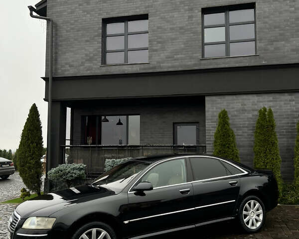 Черный Ауди А8, объемом двигателя 3 л и пробегом 279 тыс. км за 9300 $, фото 1 на Automoto.ua