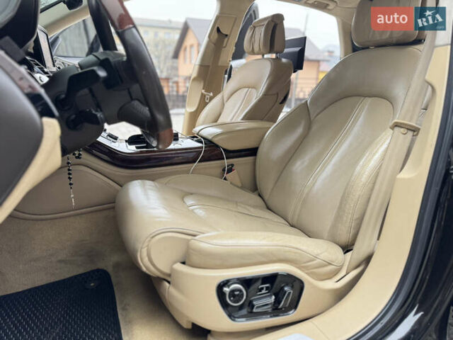 Черный Ауди А8, объемом двигателя 4.2 л и пробегом 331 тыс. км за 19999 $, фото 24 на Automoto.ua