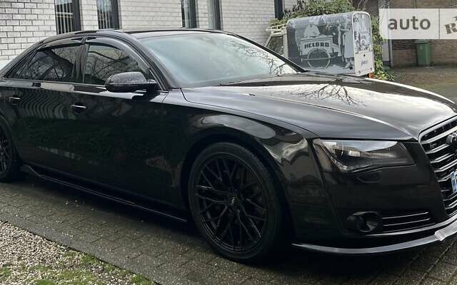 Черный Ауди А8, объемом двигателя 3 л и пробегом 192 тыс. км за 22000 $, фото 1 на Automoto.ua