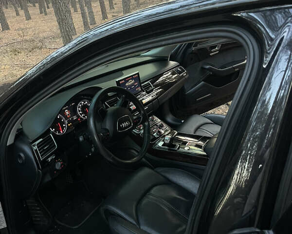 Черный Ауди А8, объемом двигателя 3 л и пробегом 180 тыс. км за 19500 $, фото 3 на Automoto.ua