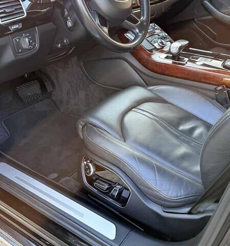 Чорний Ауді A8, об'ємом двигуна 3 л та пробігом 242 тис. км за 24400 $, фото 1 на Automoto.ua