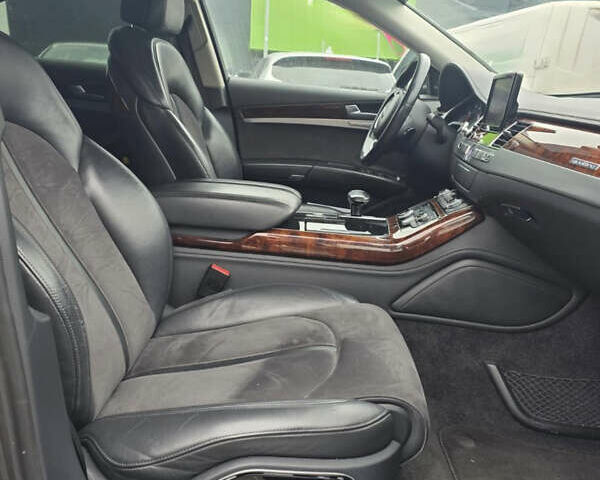 Черный Ауди А8, объемом двигателя 3 л и пробегом 210 тыс. км за 33400 $, фото 3 на Automoto.ua