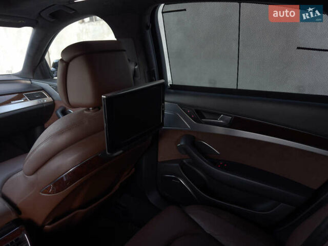 Ауді A8 2012 у Чернівцях на Automoto.ua Чорний Ауді A8, об'ємом двигуна 3 л та пробігом 181 тис. км за 22500 $, фото 19 на Automoto.ua
