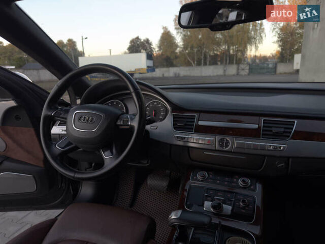Ауді A8 2012 у Чернівцях на Automoto.ua Чорний Ауді A8, об'ємом двигуна 3 л та пробігом 181 тис. км за 22500 $, фото 18 на Automoto.ua