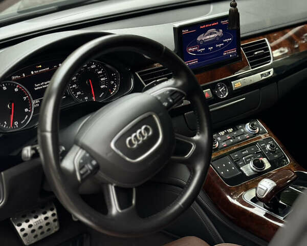 Черный Ауди А8, объемом двигателя 4 л и пробегом 211 тыс. км за 20900 $, фото 16 на Automoto.ua