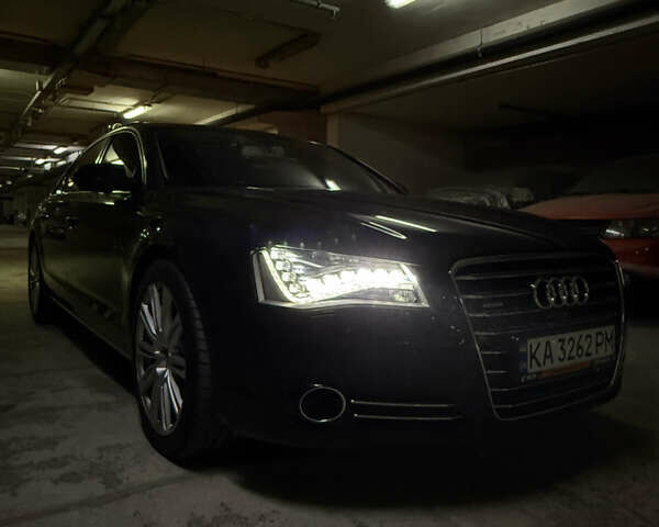 Черный Ауди А8, объемом двигателя 4 л и пробегом 240 тыс. км за 26000 $, фото 1 на Automoto.ua