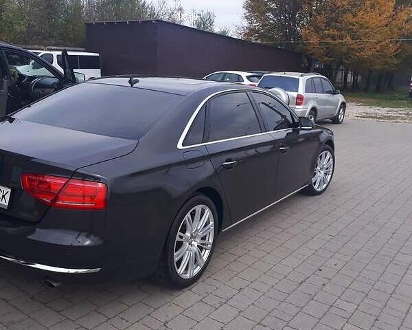 Чорний Ауді A8, об'ємом двигуна 3 л та пробігом 100 тис. км за 22500 $, фото 1 на Automoto.ua