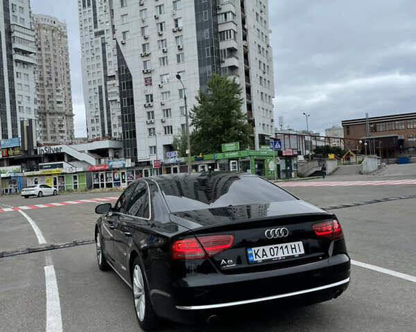 Черный Ауди А8, объемом двигателя 3 л и пробегом 155 тыс. км за 16500 $, фото 1 на Automoto.ua
