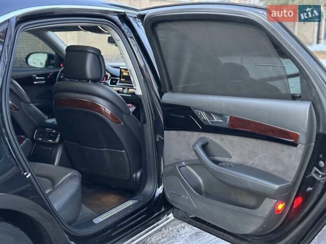 Черный Ауди А8, объемом двигателя 3 л и пробегом 261 тыс. км за 19750 $, фото 37 на Automoto.ua