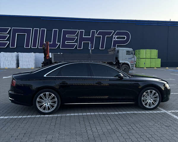 Черный Ауди А8, объемом двигателя 3 л и пробегом 200 тыс. км за 15000 $, фото 1 на Automoto.ua