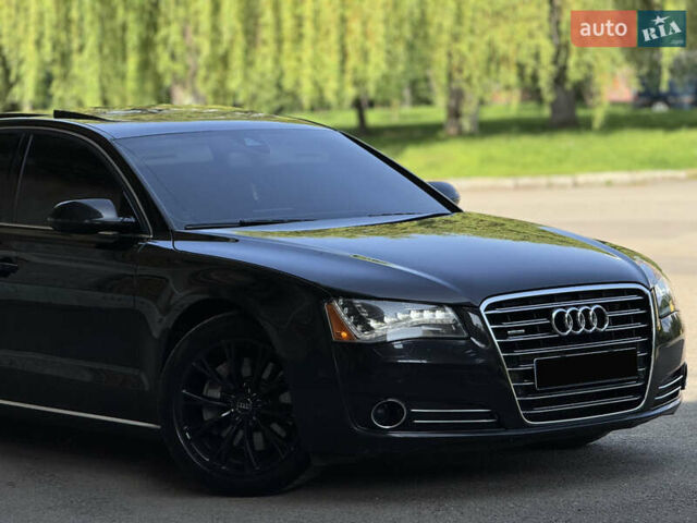 Черный Ауди А8, объемом двигателя 3 л и пробегом 235 тыс. км за 15500 $, фото 1 на Automoto.ua
