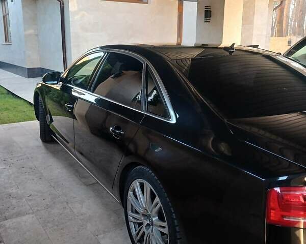 Черный Ауди А8, объемом двигателя 3 л и пробегом 118 тыс. км за 19300 $, фото 3 на Automoto.ua