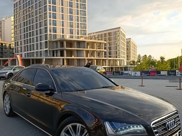 Черный Ауди А8, объемом двигателя 6 л и пробегом 260 тыс. км за 20000 $, фото 1 на Automoto.ua