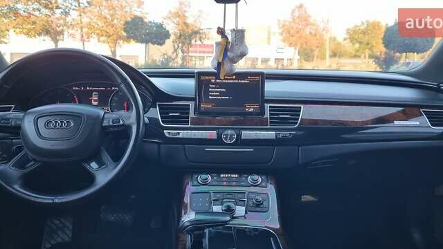 Ауді A8 2014 у Кривому Розі на Automoto.ua Чорний Ауді A8, об'ємом двигуна 3 л та пробігом 245 тис. км за 19000 $, фото 23 на Automoto.ua