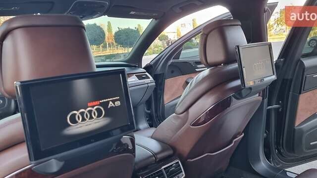 Ауді A8 2014 у Кривому Розі на Automoto.ua Чорний Ауді A8, об'ємом двигуна 3 л та пробігом 245 тис. км за 19000 $, фото 60 на Automoto.ua