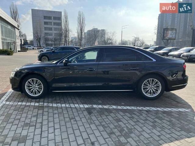 Черный Ауди А8, объемом двигателя 3 л и пробегом 172 тыс. км за 28000 $, фото 1 на Automoto.ua