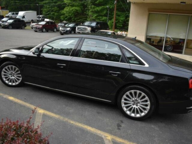 Ауді A8 2014 у Івано-Франківську на Automoto.ua Чорний Ауді A8, об'ємом двигуна 4 л та пробігом 87 тис. км за 6500 $, фото 2 на Automoto.ua