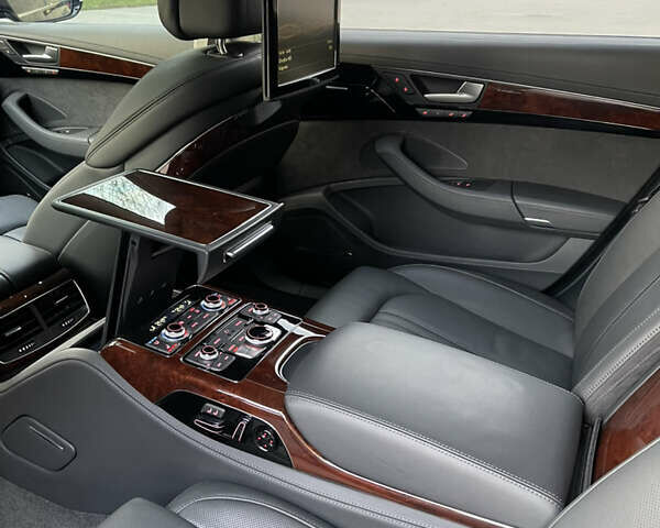 Чорний Ауді A8, об'ємом двигуна 3.99 л та пробігом 56 тис. км за 40000 $, фото 77 на Automoto.ua