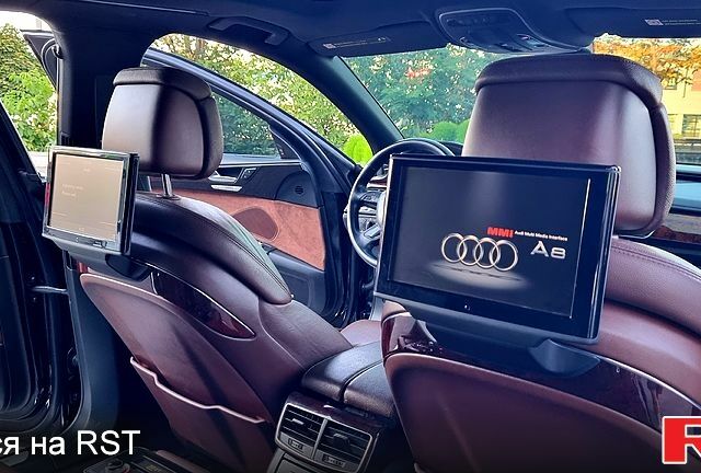 Черный Ауди А8, объемом двигателя 3 л и пробегом 245 тыс. км за 19000 $, фото 12 на Automoto.ua
