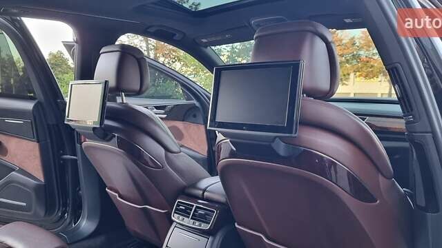 Ауді A8 2014 у Кривому Розі на Automoto.ua Чорний Ауді A8, об'ємом двигуна 3 л та пробігом 245 тис. км за 19000 $, фото 67 на Automoto.ua
