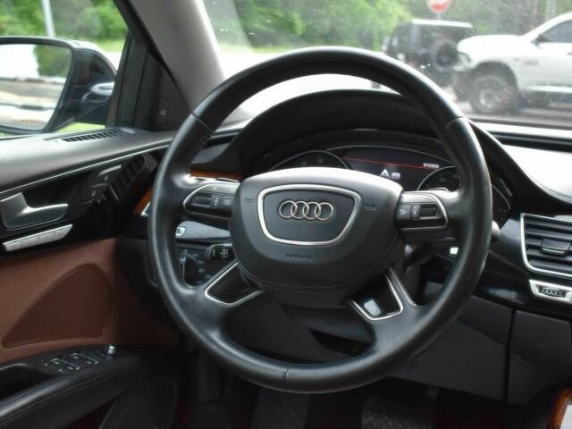 Ауді A8 2014 у Івано-Франківську на Automoto.ua Чорний Ауді A8, об'ємом двигуна 4 л та пробігом 87 тис. км за 6500 $, фото 7 на Automoto.ua