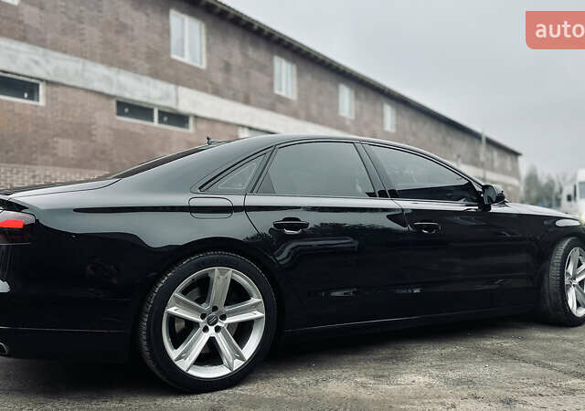 Черный Ауди А8, объемом двигателя 3 л и пробегом 189 тыс. км за 19300 $, фото 1 на Automoto.ua