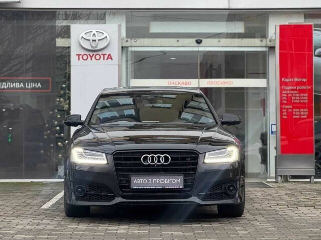 Черный Ауди А8, объемом двигателя 3 л и пробегом 218 тыс. км за 19569 $, фото 1 на Automoto.ua